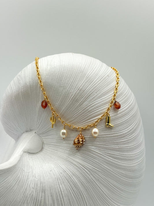 COASTAL COWGIRL NECKLACE (Brown Mouth Drupe)