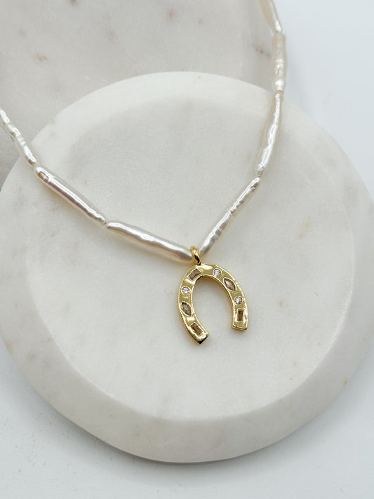 THE LUCKY NECKLACE